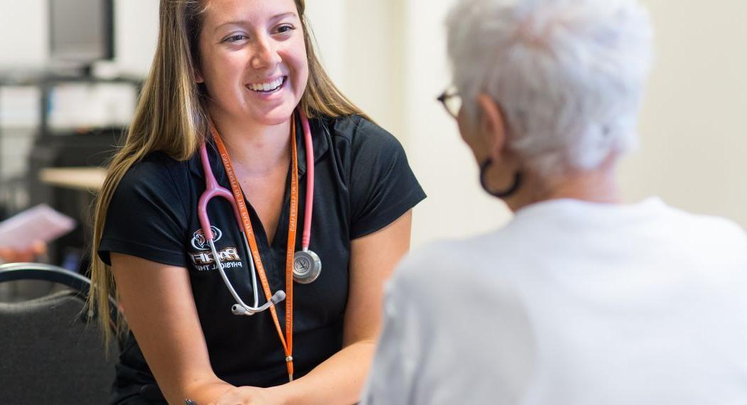 a student working with a patient