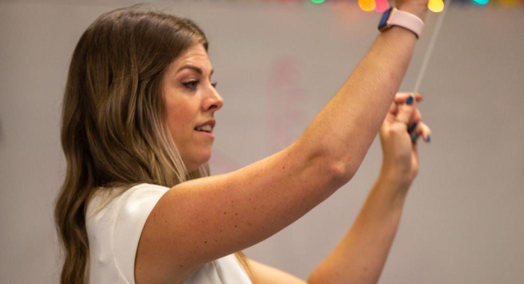 a music teacher in a classroom